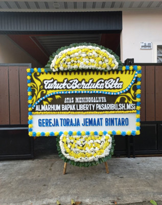Papan Bunga Duka di Metro