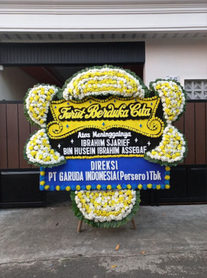 Papan Bunga Duka di Metro